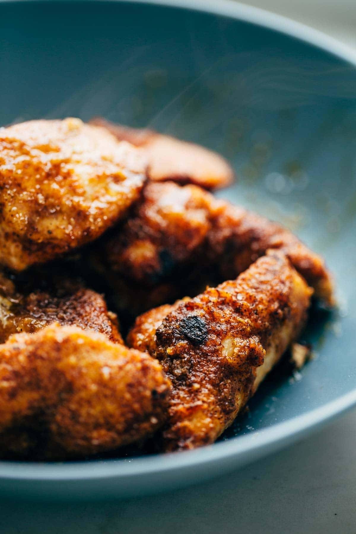 Chicken in a blue bowl.