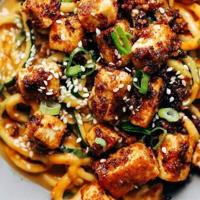 Sesame Zoodles wiht Tofu in a bowl.