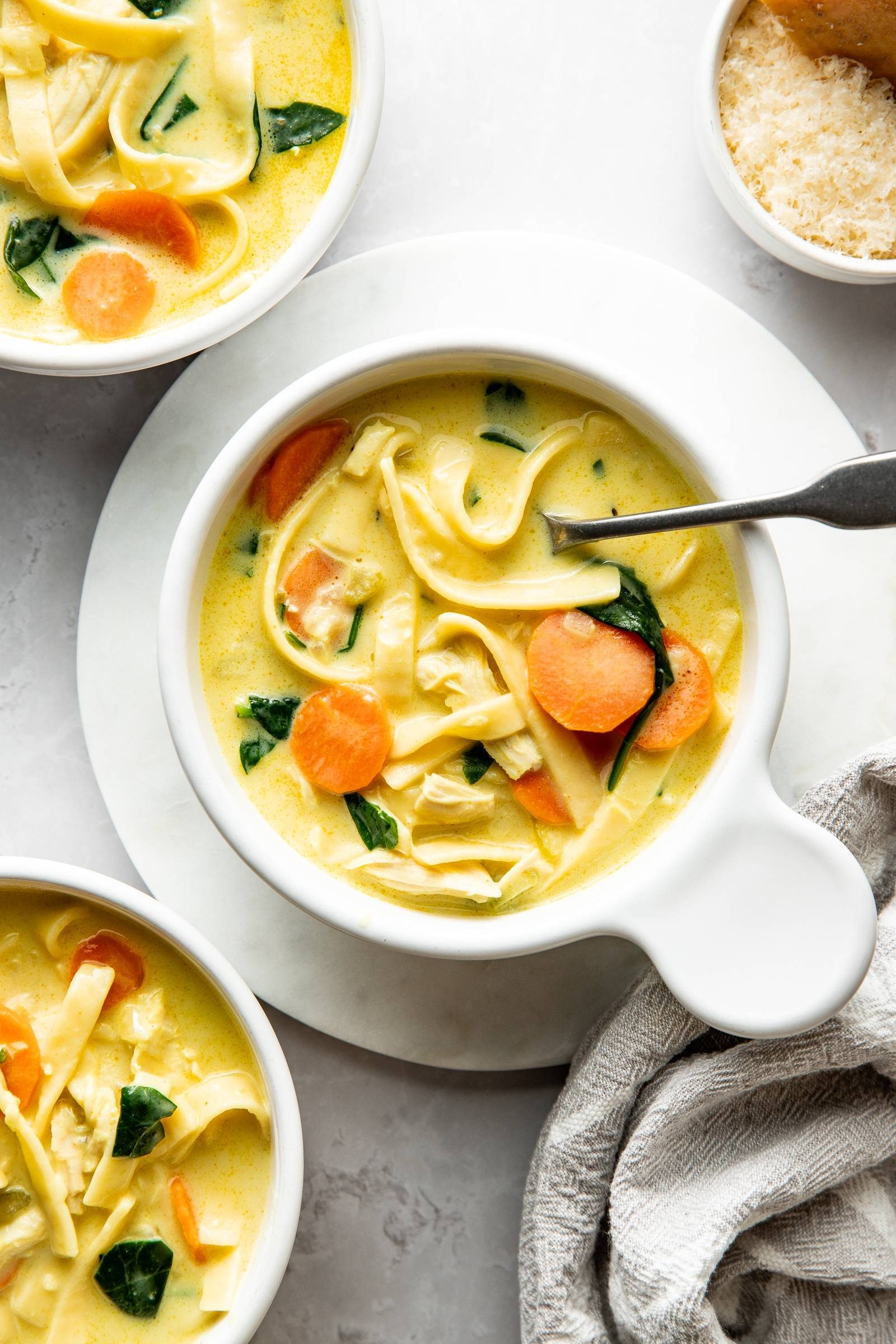 Creamy chicken noodle soup in a bowl.