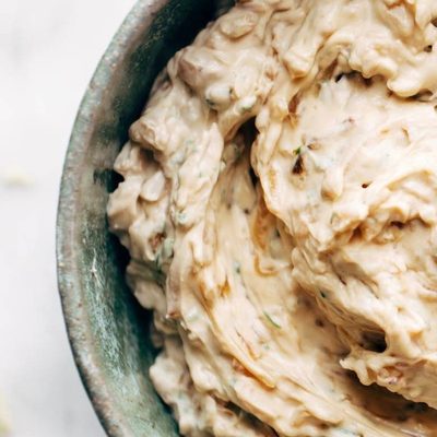 A large rustic bowl of onion dip.