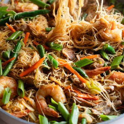 Pancit in a skillet.