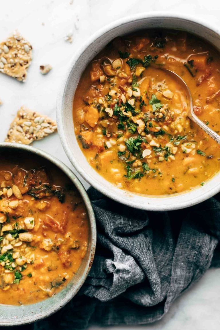Spicy peanut soup in two bowls.